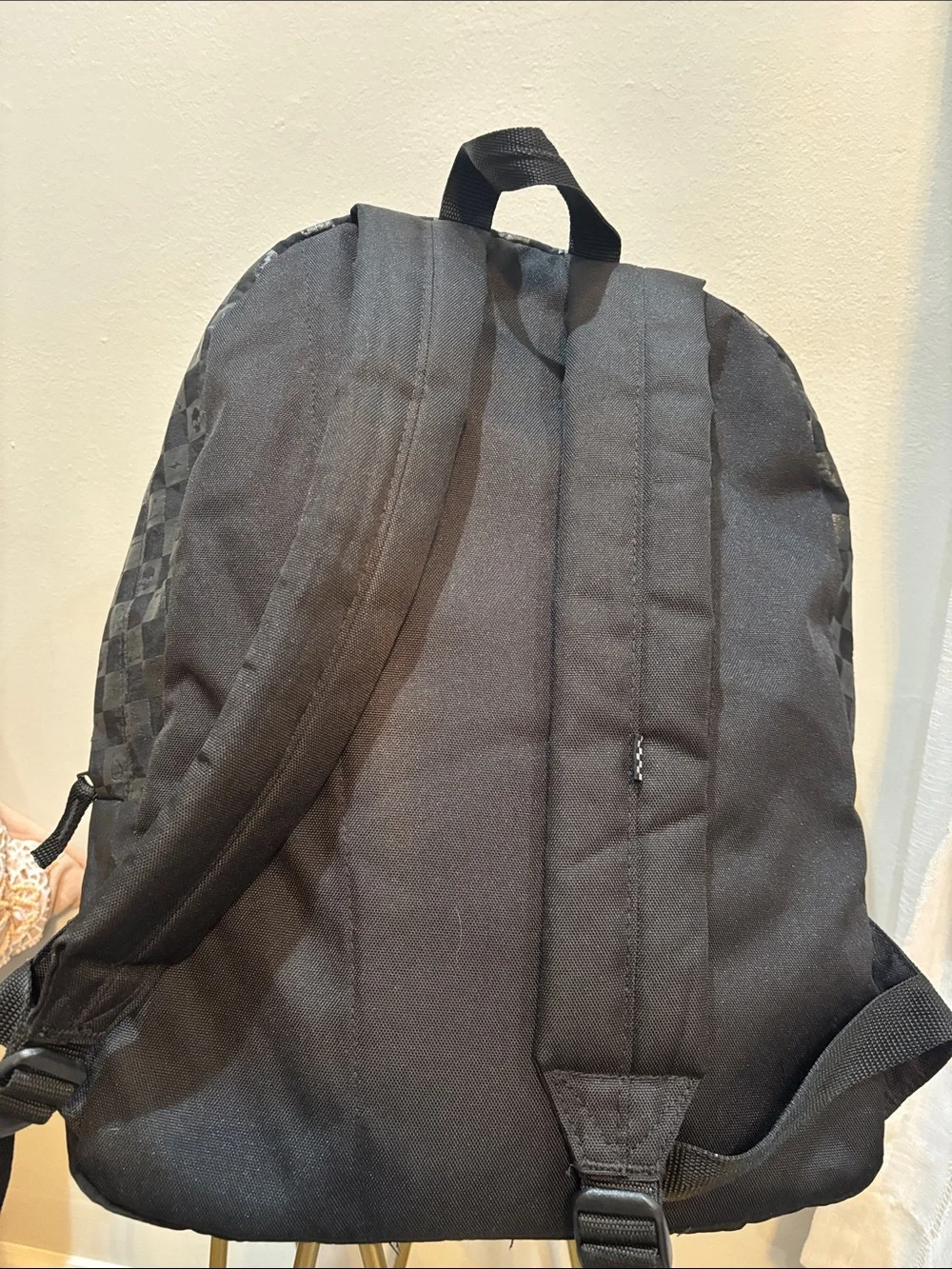 Vans Black Backpack with White Snake Crest and Checker Trim